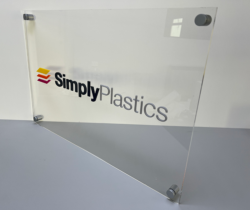 A finished laser cut perspex sign